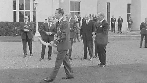 King Baudouin of Belgium tried out hurling while visiting Áras an Uachtaráin.