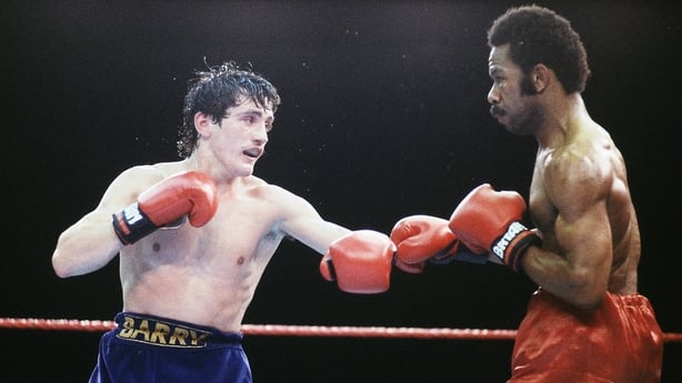 More than 26,000 people in London watched McGuigan clinch the title.