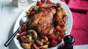 Spanish-style roast chicken with potato wedges