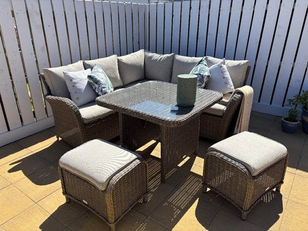 a patio furniture set on a deck