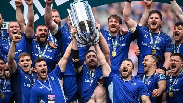 14 June 2025; Leinster captain Jack Conan, centre, alongside team-mates Caelan Doris, left, and Cian Healy, right, lift the cup after their side's victory in the United Rugby Championship Grand Final match between Leinster and Vodacom Bulls at Croke Park in Dublin. Photo by David Fitzgerald/Sportsfi