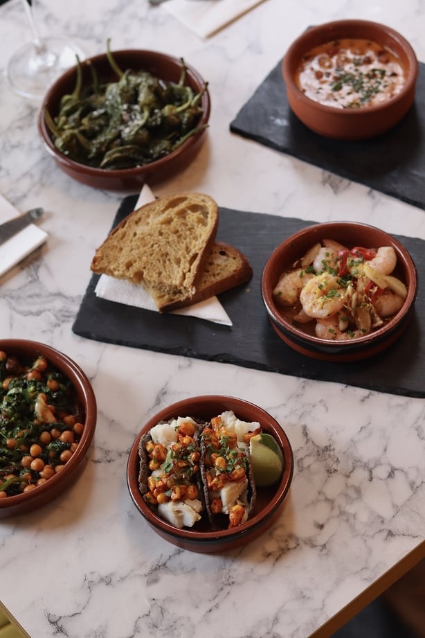 a table with bowls of food