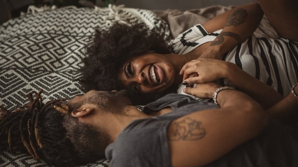 Young couple on bed enjoy in weekend