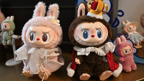 Mokoko (L) and Labubu in an exhibition room at Pop Mart's theme park Pop Land in Beijing