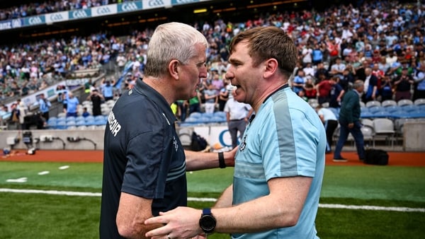 Limerick boss John Kiely (L) congratulates Dublin manager Niall Ó Ceallacháin after the game