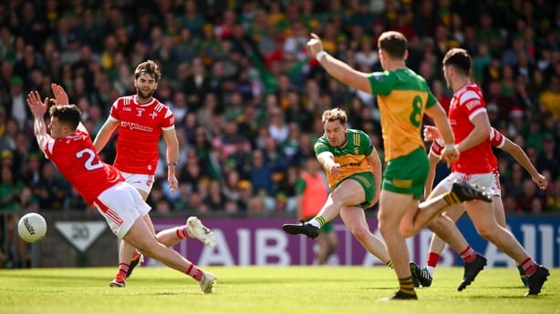 22 June 2025; Ciaran Thompson of Donegal scores his side's second goal during the GAA Football All-Ireland Senior Championship preliminary quarter-final match between Donegal and Louth at MacCumhaill Park in Ballybofey, Donegal. Photo by Ramsey Cardy/Sportsfile