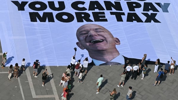Activists unveiled a banner in St Mark's Square