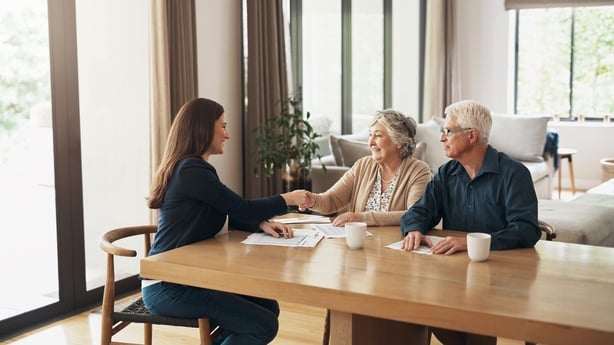 Handshake, broker or happy old couple consulting in meeting for retirement pension or tax bill advice. Financial advisor, elderly man or senior woman shaking hands for investment deal or savings plan