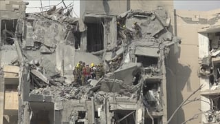 Israeli rescuers survey damage, search for survivors after Iranian missile strike