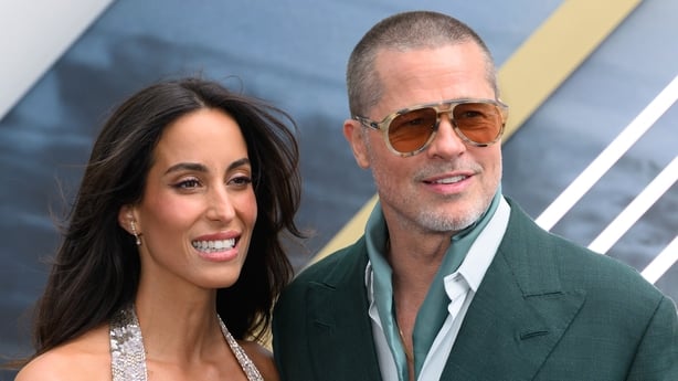 : Ines de Ramon and Brad Pitt