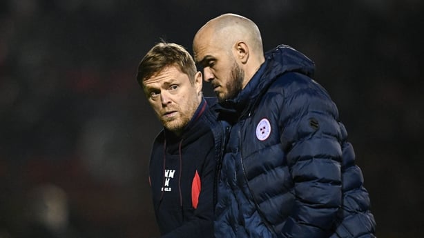 Shelbourne manager Damien Duff, left, and assistant manager Joey O'Brien leave the pitch at half-time during the SSE Airtricity Men's Premier Division match between Shelbourne and Drogheda United at Tolka Park in Dublin.