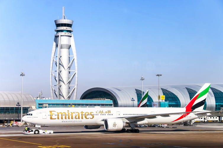 An Emirates plane taxiing in the Dubai International Airport.